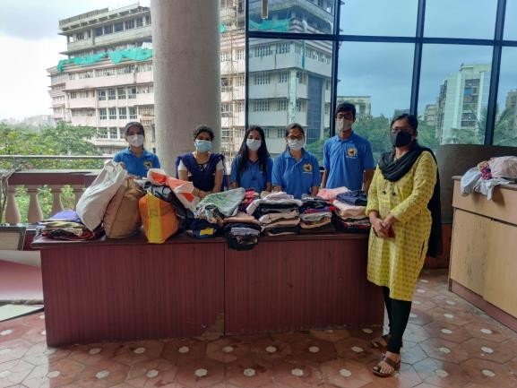 Photographs with few faculties who donated in the 3 day long clothes donation drive